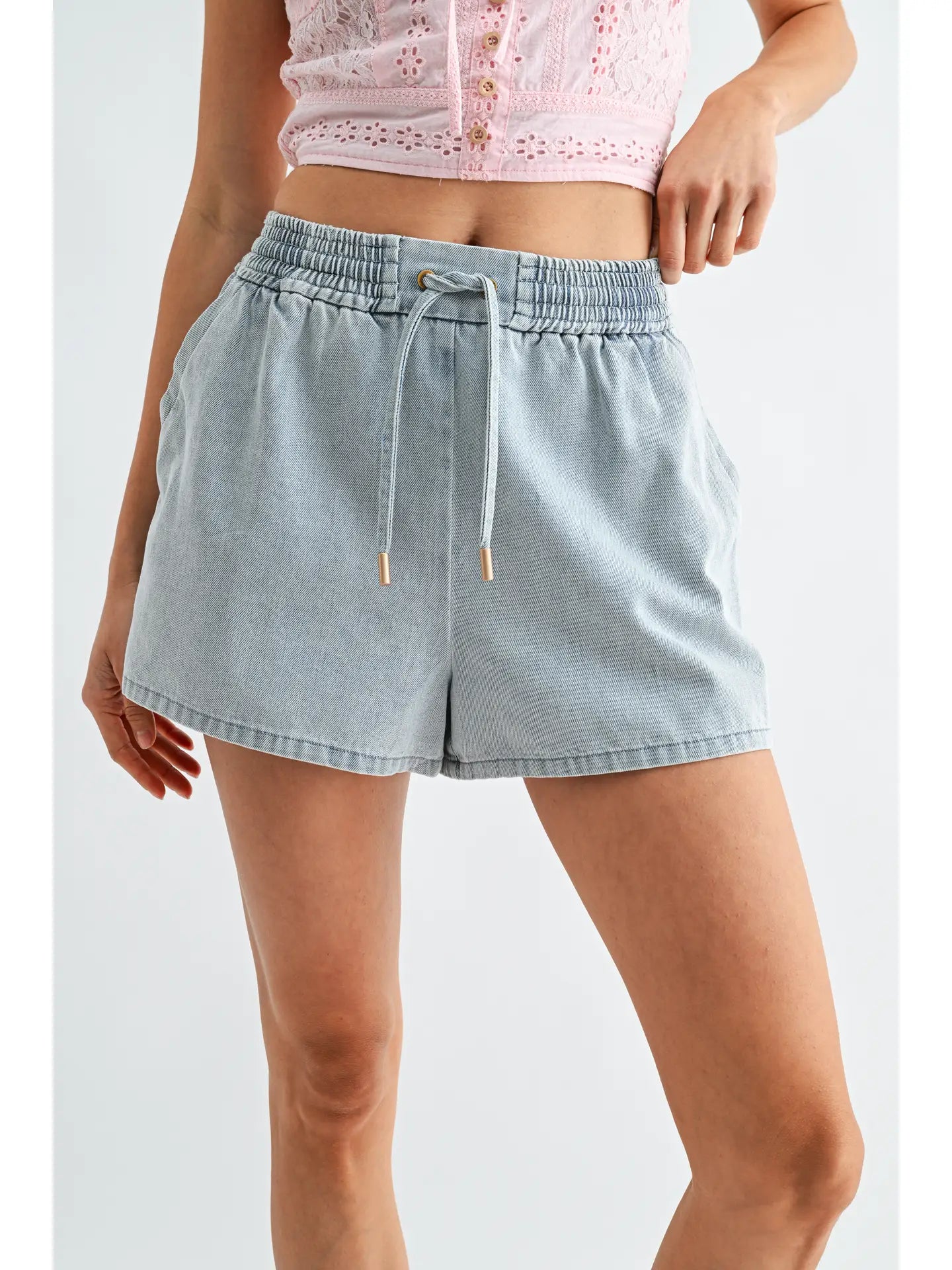 Washed denim drawstring shorts with side button detail and relaxed fit