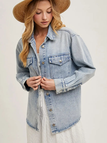 Washed denim button down shirt jacket with relaxed fit, soft fabric, and layered shacket style