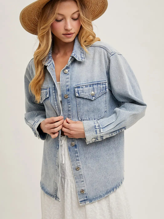 Washed denim button down shirt jacket with relaxed fit, soft fabric, and layered shacket style