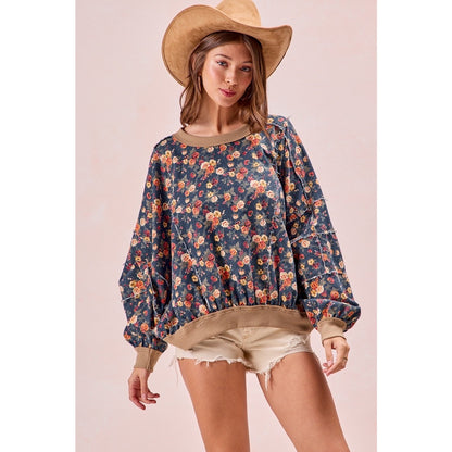 Washed floral denim top with frayed edges and relaxed fit — available at Frost Impressions Boutique in Wapakoneta, Ohio.