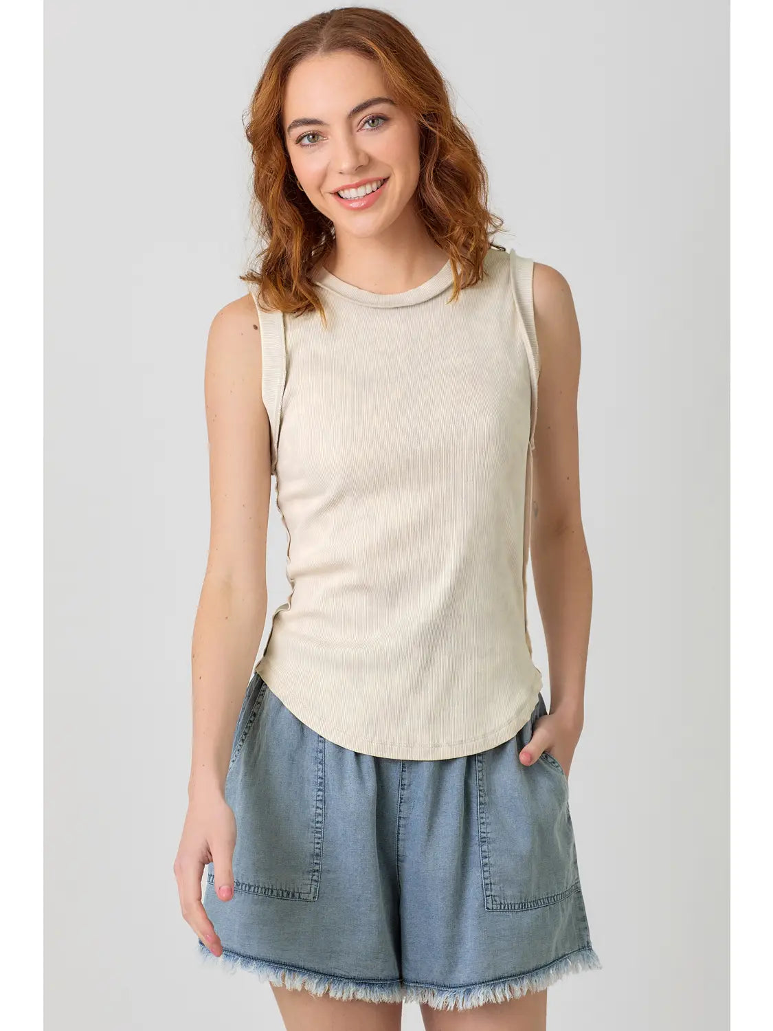 Washed ribbed tank top with hi-lo hem, round neck, and fitted everyday style in multiple colors