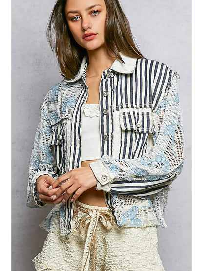 Blue patchwork long sleeve woven jacket with cable knit and lace floral details, button front, and relaxed fit