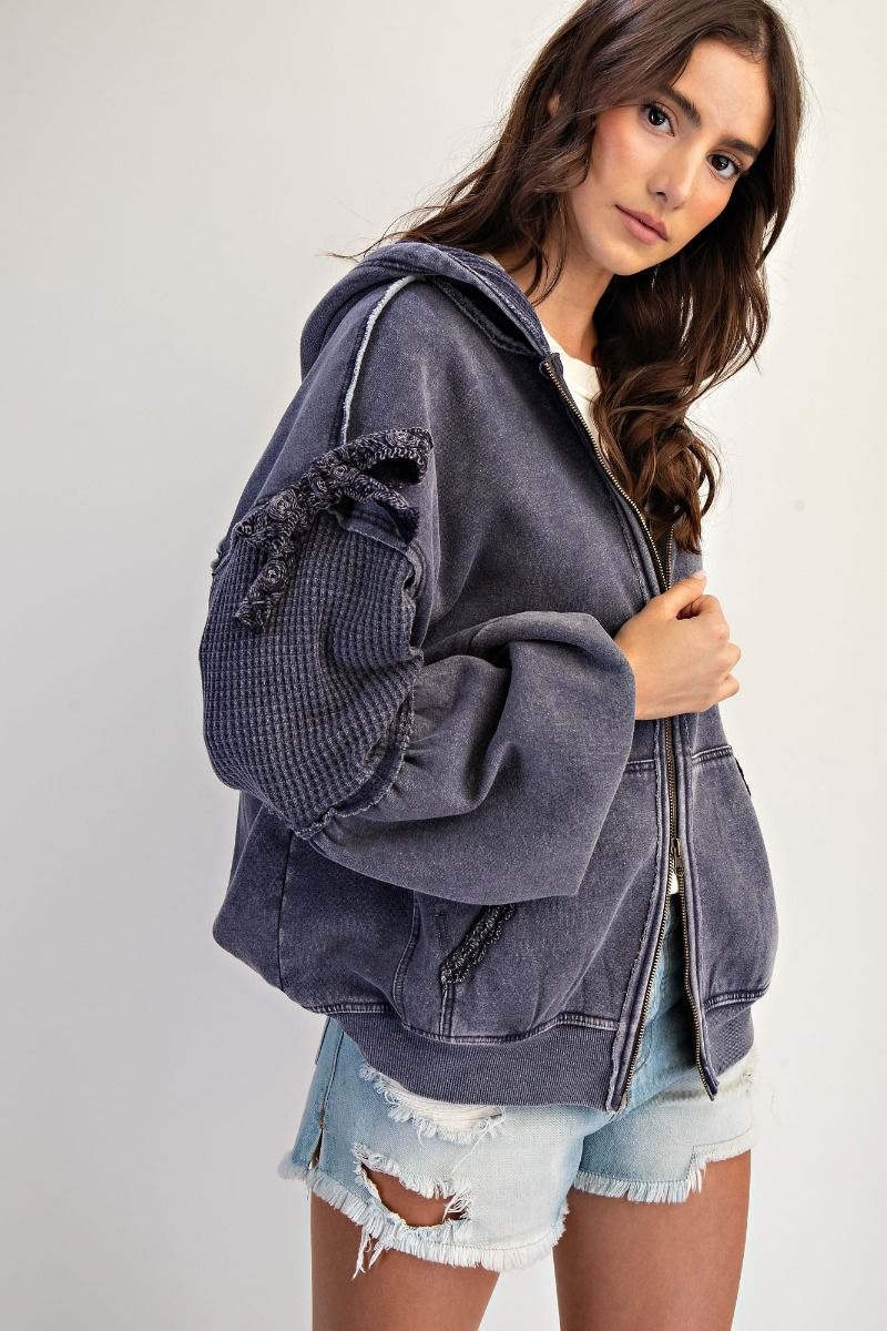 Clara Bow Tie Zip Up washed terry knit hoodie jacket with mineral wash finish, waffle knit contrast panels, and tie sleeve details.