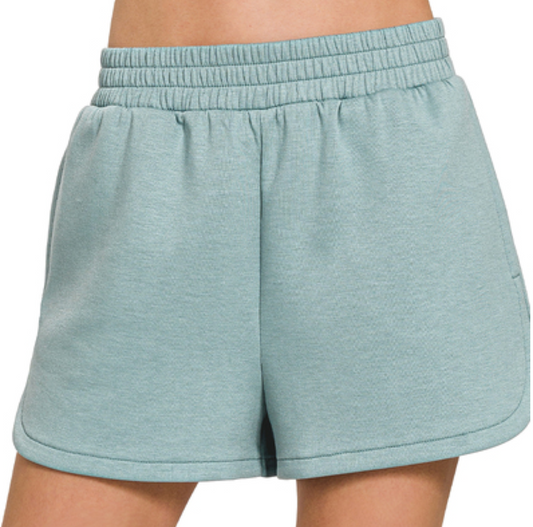 Scuba fabric dolphin shorts with elastic waistband in black, blue grey, pink, and blue tones