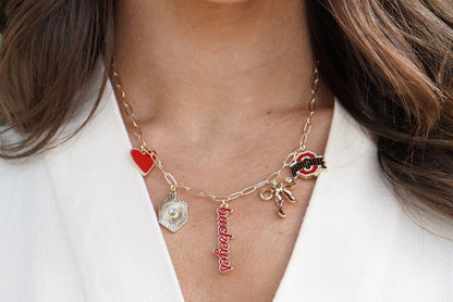 Gold buckeye charm necklace with red and silver accent beads — Frost Impressions Boutique, Wapakoneta, Ohio.