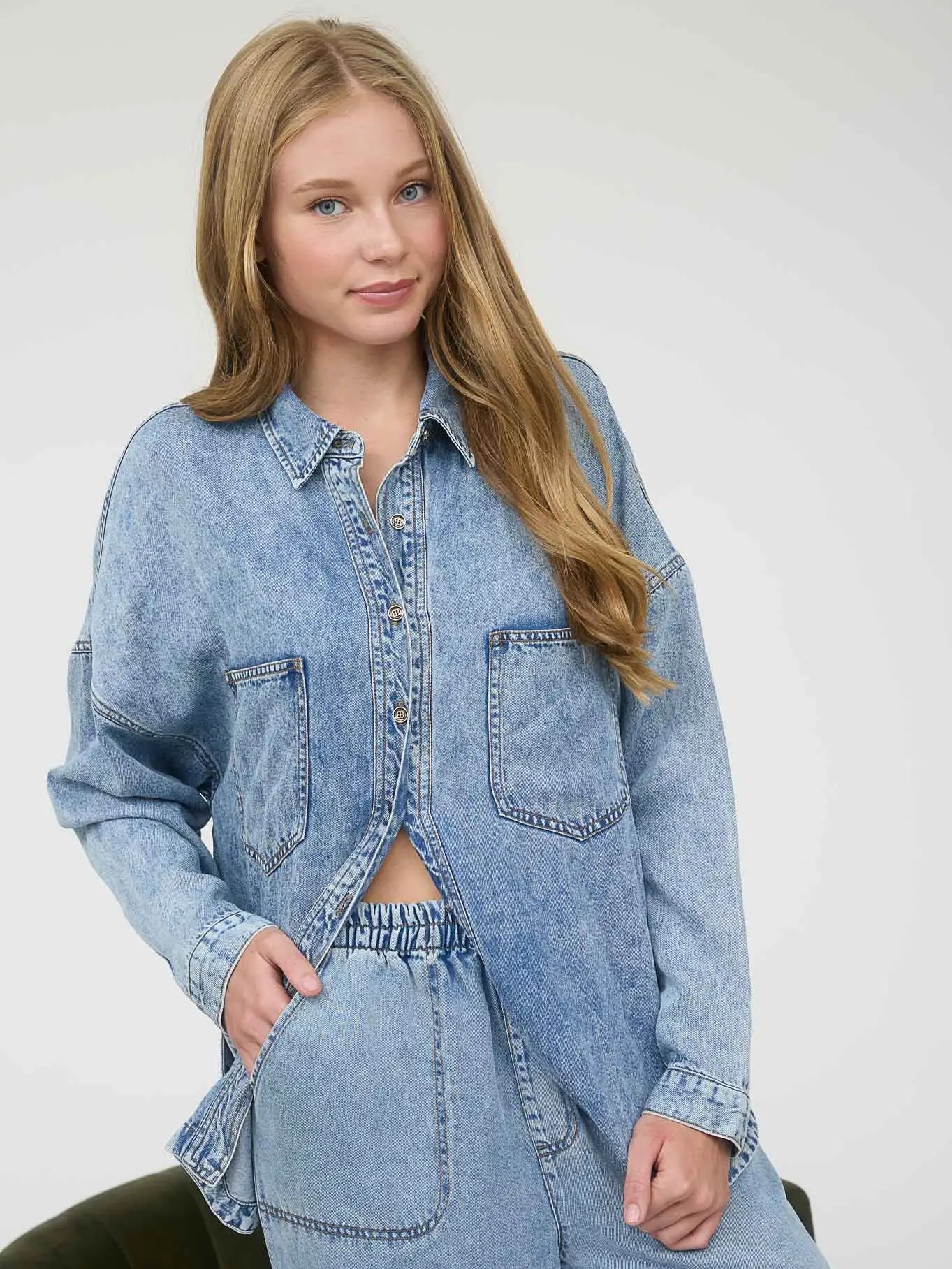 Oversized washed chambray button down denim shirt with relaxed fit and ultra-soft fabric