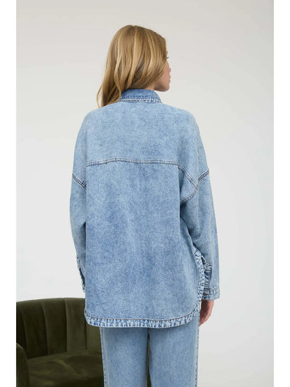 Oversized washed chambray button down denim shirt with relaxed fit and ultra-soft fabric