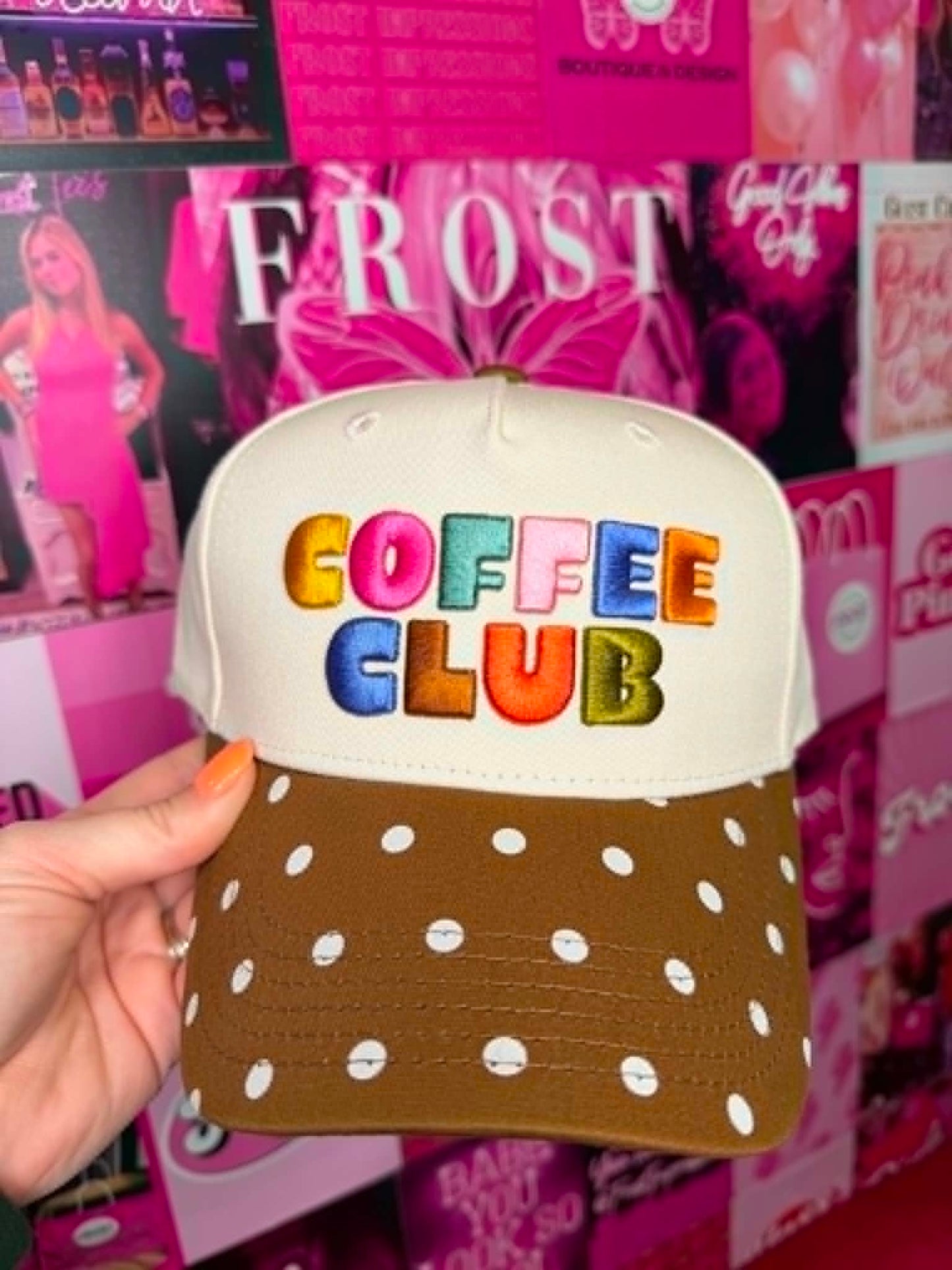 Trucker hat with Coffee Club graphic design, mesh back, and casual everyday style