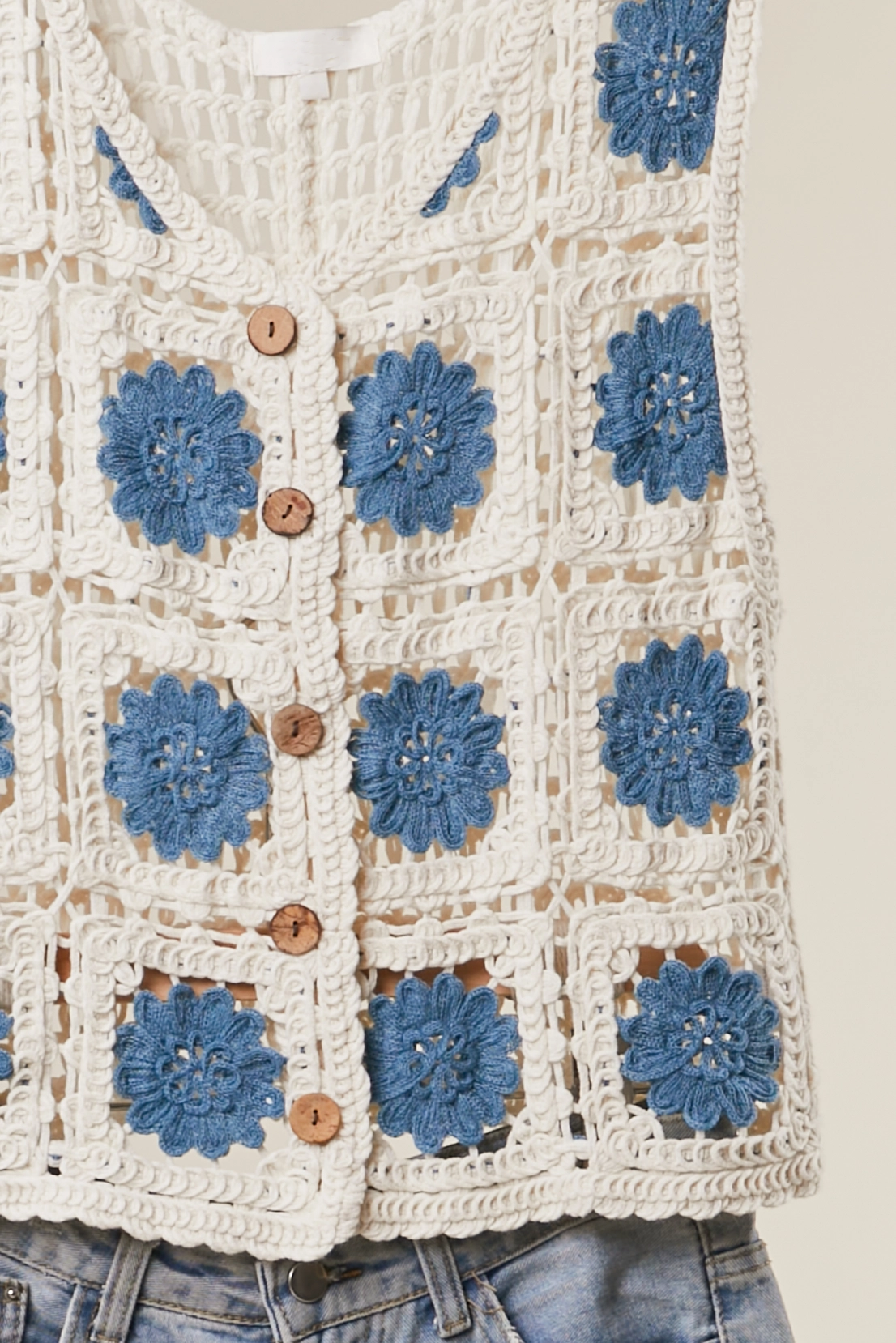Crochet style tank top sweater with open knit design in a lightweight, breathable summer style