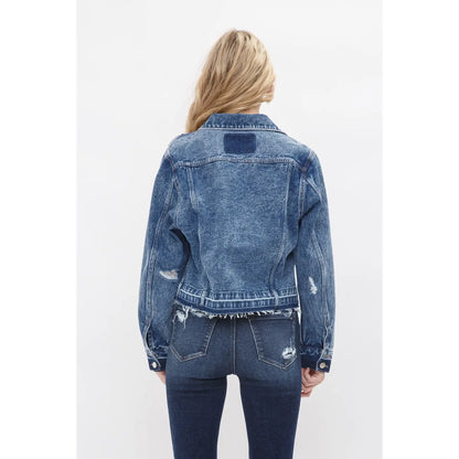 Boyfriend style cropped denim jacket with undone hem, relaxed fit, and classic button front