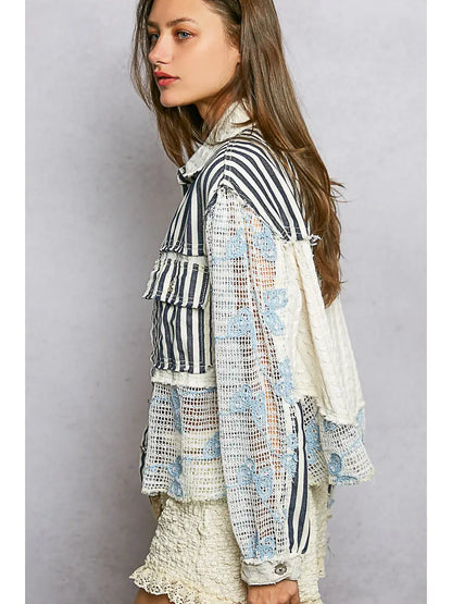 Blue patchwork long sleeve woven jacket with cable knit and lace floral details, button front, and relaxed fit