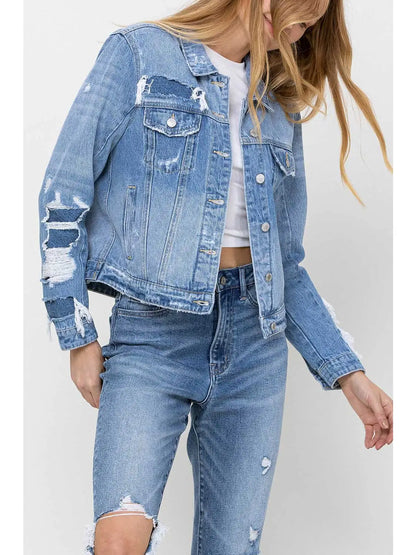 Distressed cropped denim jacket with deconstructed details — Rebel Blues Denim Jacket from Frost Impressions Boutique.
