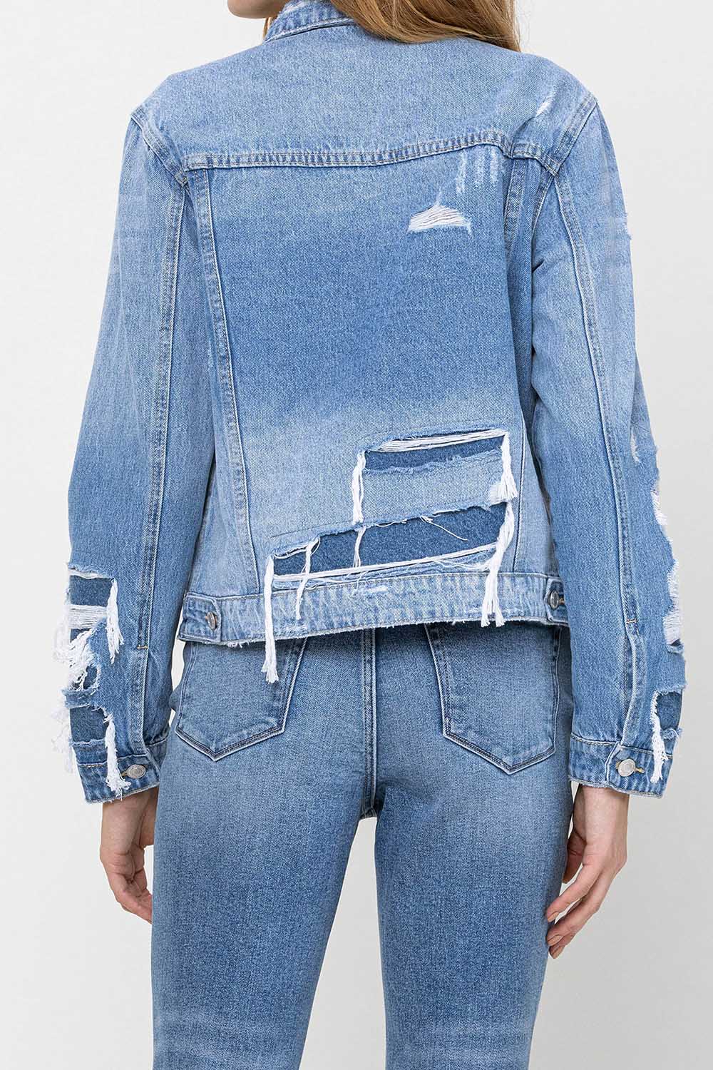 Distressed cropped denim jacket with deconstructed details — Rebel Blues Denim Jacket from Frost Impressions Boutique.