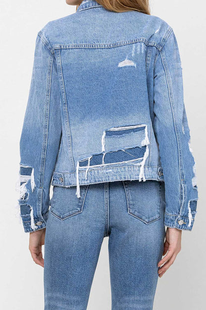 Distressed cropped denim jacket with deconstructed details — Rebel Blues Denim Jacket from Frost Impressions Boutique.