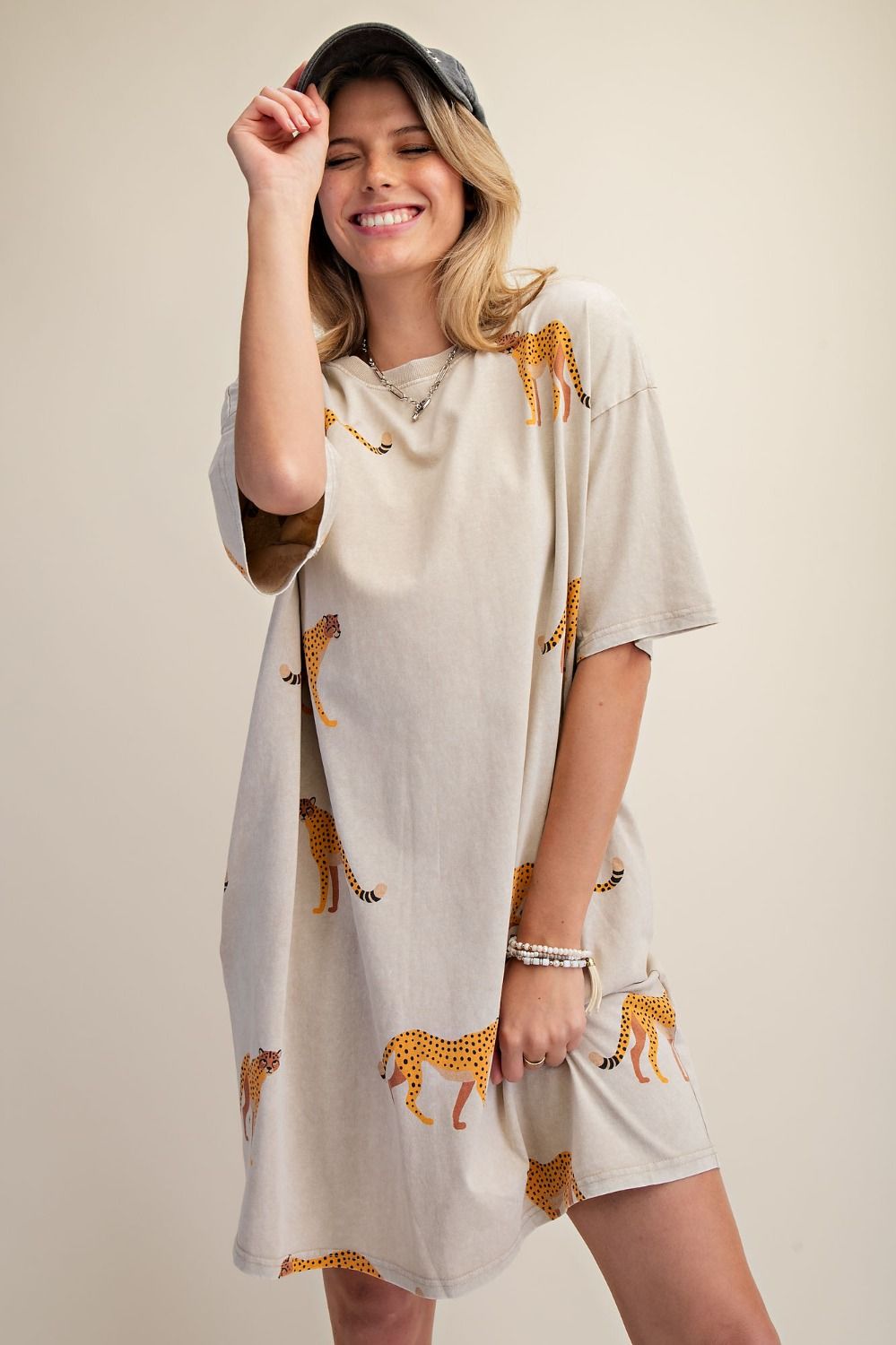 Mineral washed cheetah print t-shirt dress with relaxed fit, half sleeves, and side pockets