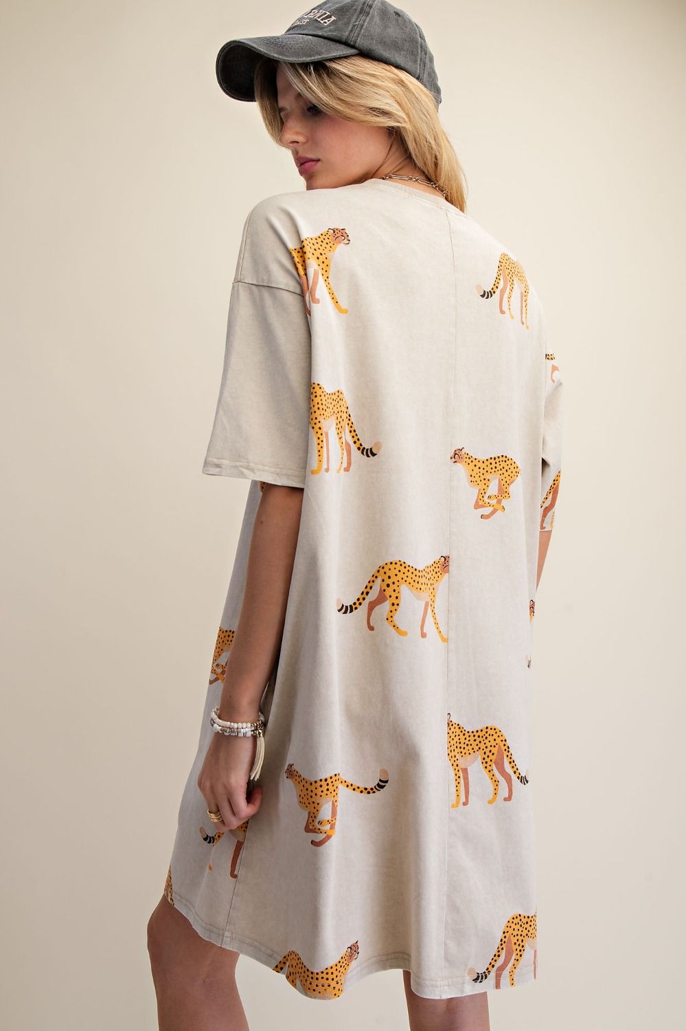 Mineral washed cheetah print t-shirt dress with relaxed fit, half sleeves, and side pockets