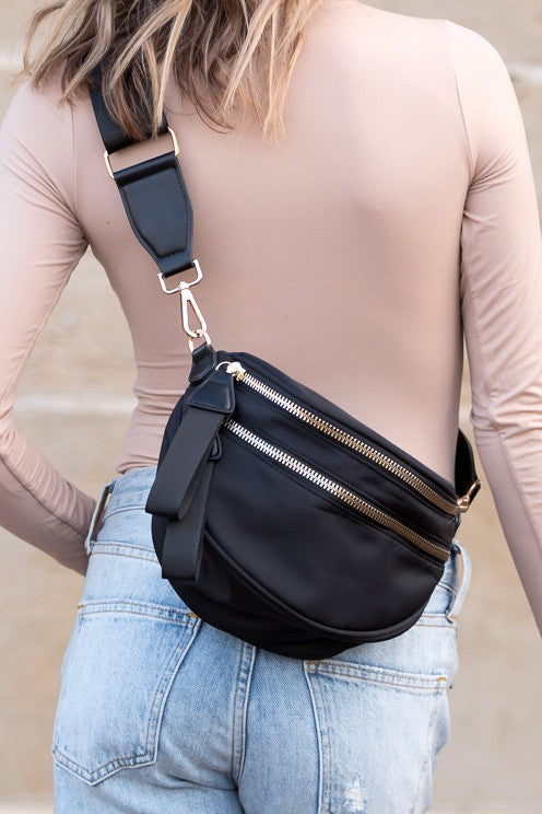 Gia Sling (Black) — black nylon crossbody sling bag with gold hardware and vegan leather accents, available at Frost Impressions Boutique in Wapakoneta, Ohio.