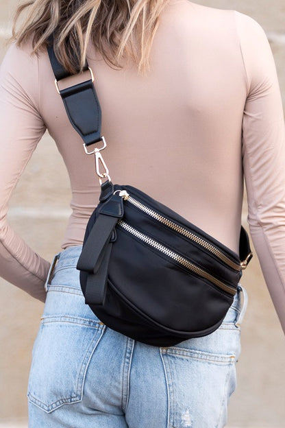 Gia Sling (Black) — black nylon crossbody sling bag with gold hardware and vegan leather accents, available at Frost Impressions Boutique in Wapakoneta, Ohio.
