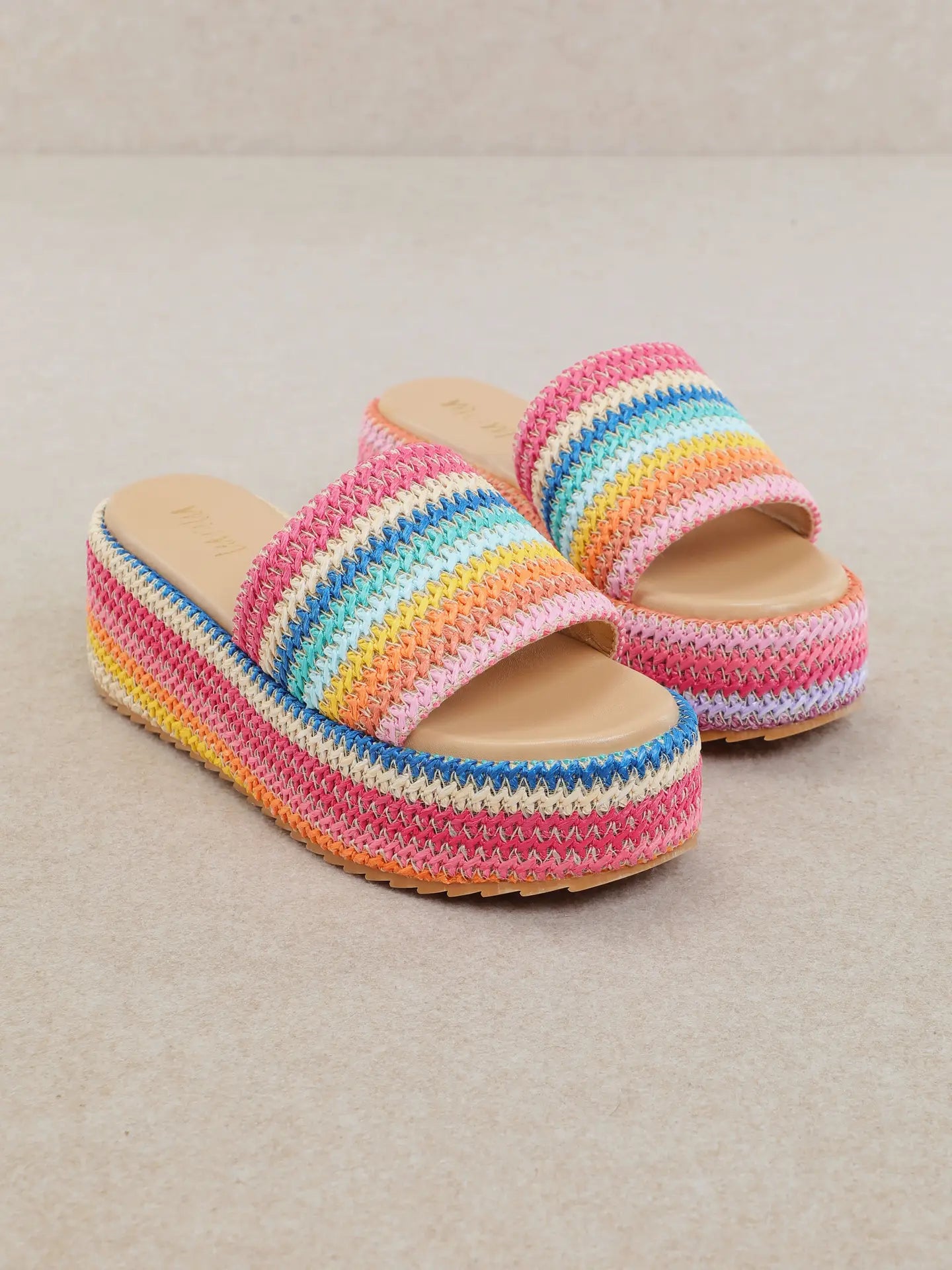 Colorful platform sandals with textured rainbow design and cushioned sole for everyday summer wear