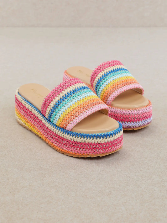 Colorful platform sandals with textured rainbow design and cushioned sole for everyday summer wear
