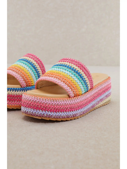 Colorful platform sandals with textured rainbow design and cushioned sole for everyday summer wear