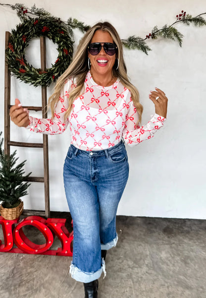 Red Bows sheer holiday mesh long sleeve top with thumbholes — Frost Impressions Boutique, Wapakoneta, Ohio.