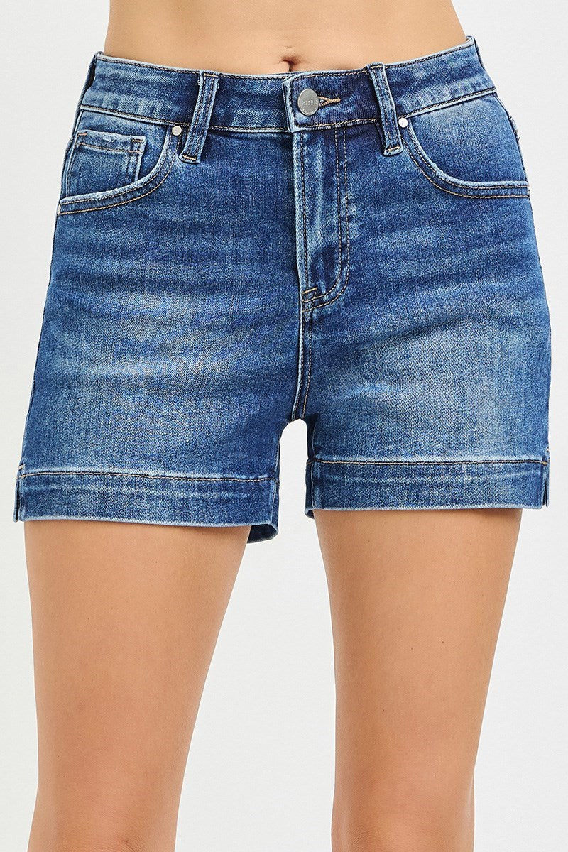 Dark wash high rise denim shorts with side slit detail and flattering fit