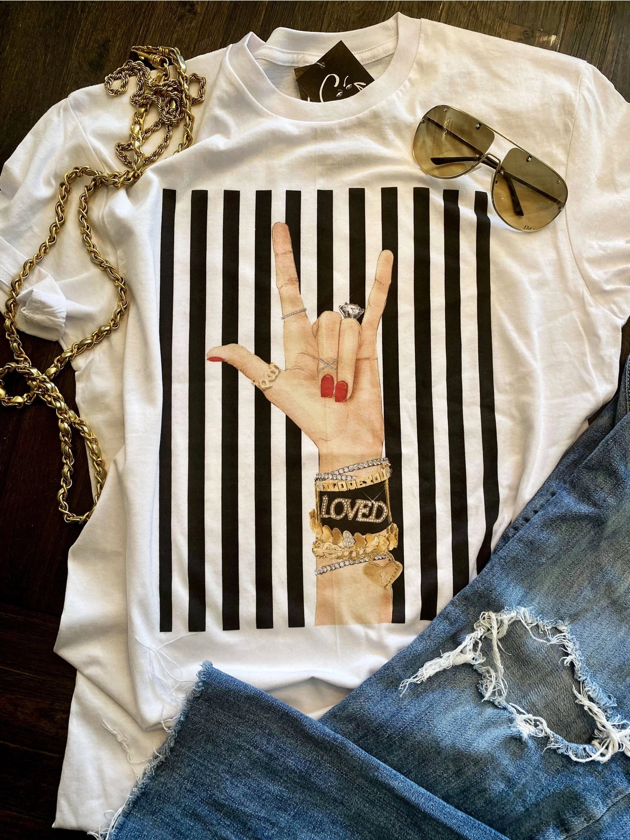 Red and white Loved Graphic Tee with bold lettering — Loved Graphic Tee from Frost Impressions Boutique.