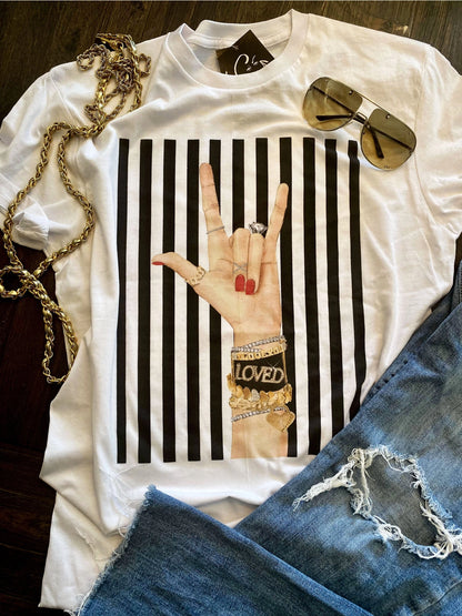 Red and white Loved Graphic Tee with bold lettering — Loved Graphic Tee from Frost Impressions Boutique.